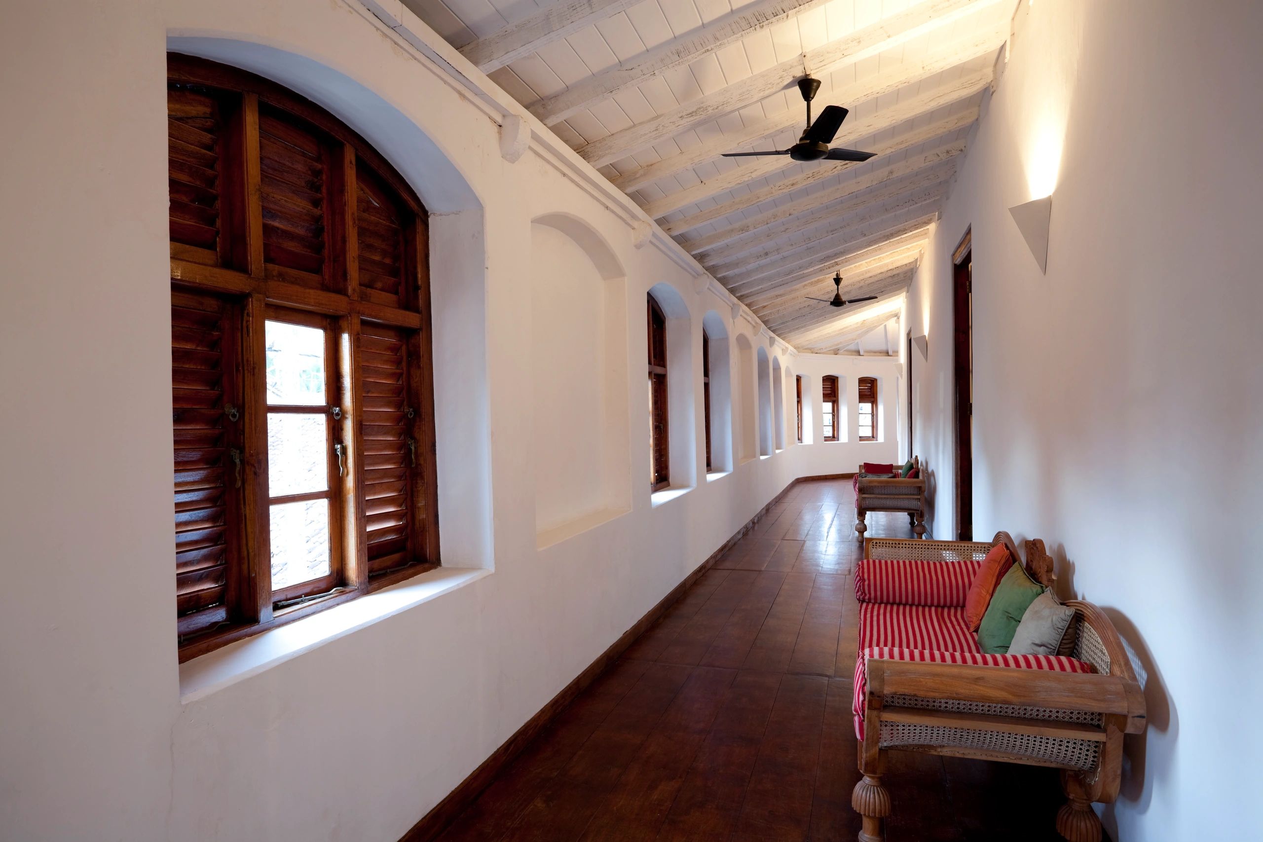 Green building hotel room with natural light and earthy tones